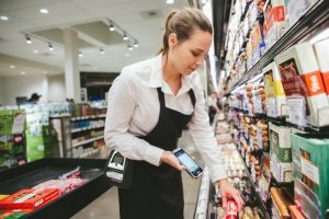 woman using zebra handheld scanner