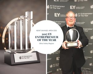 Kent Savage holding EOY Award