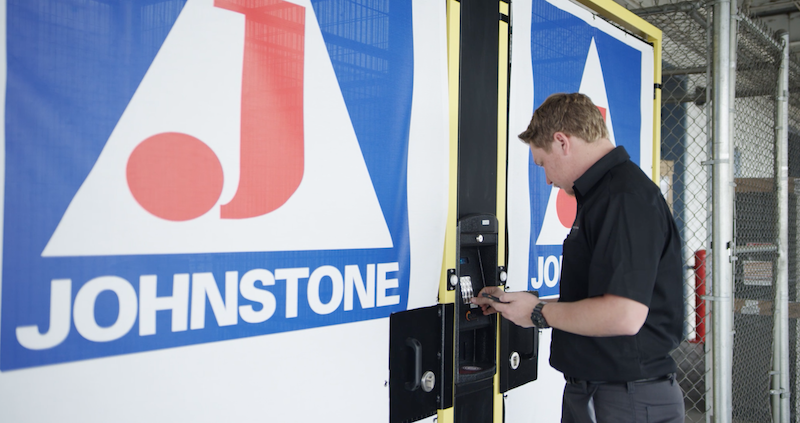 Customer using ecommerce order pickup lockers at Johnstone Supply