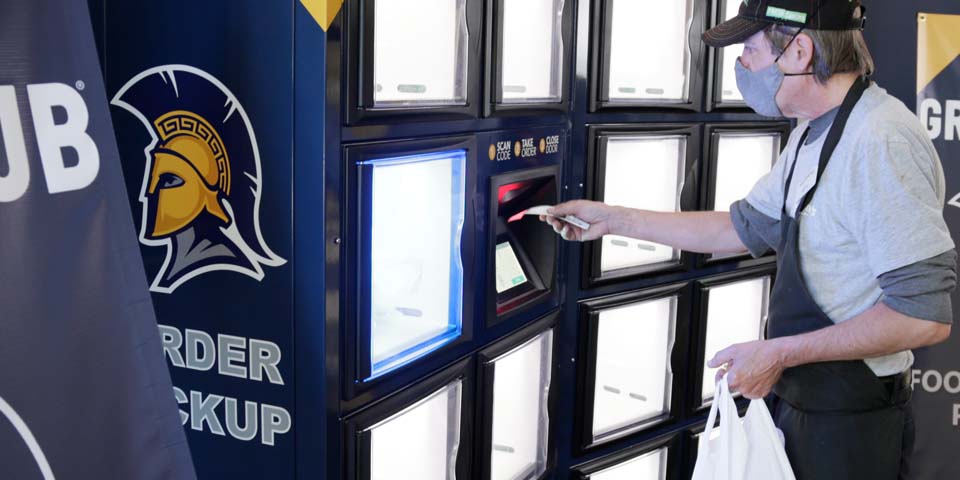 Employee loading UNC Greensboro Food Lockers