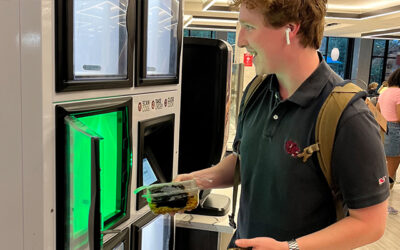 University of South Carolina happy student using Apex Smart Food Lockers