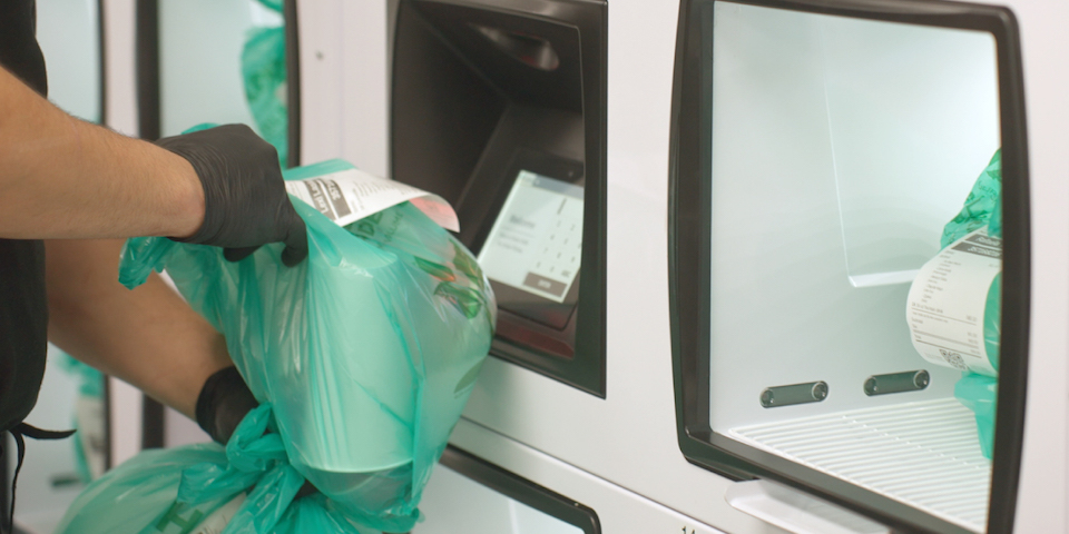 Employee loading order into OrderHQ Food Locker