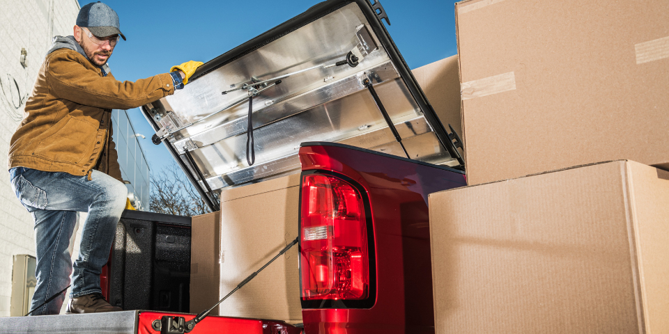 b2b customer loading boxes into truck