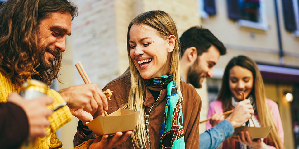 people eating takeout food