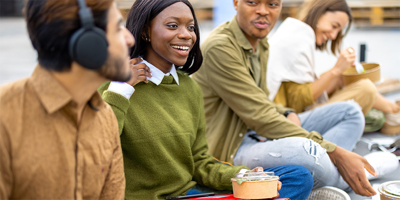 Happy students eating